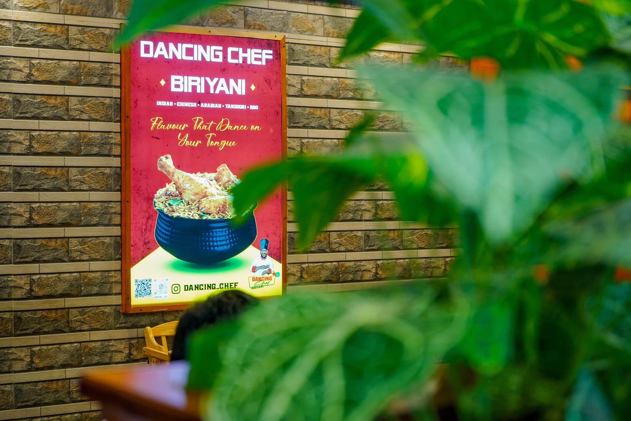 The restaurant and its lit signage at dusk — Dancing Chef Biriyani, Coimbatore (4)